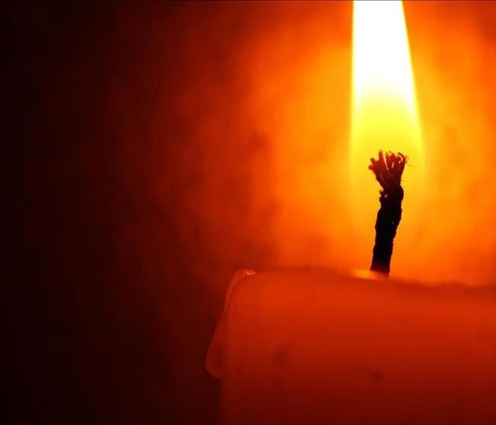 Close up shot of a burning candle.
